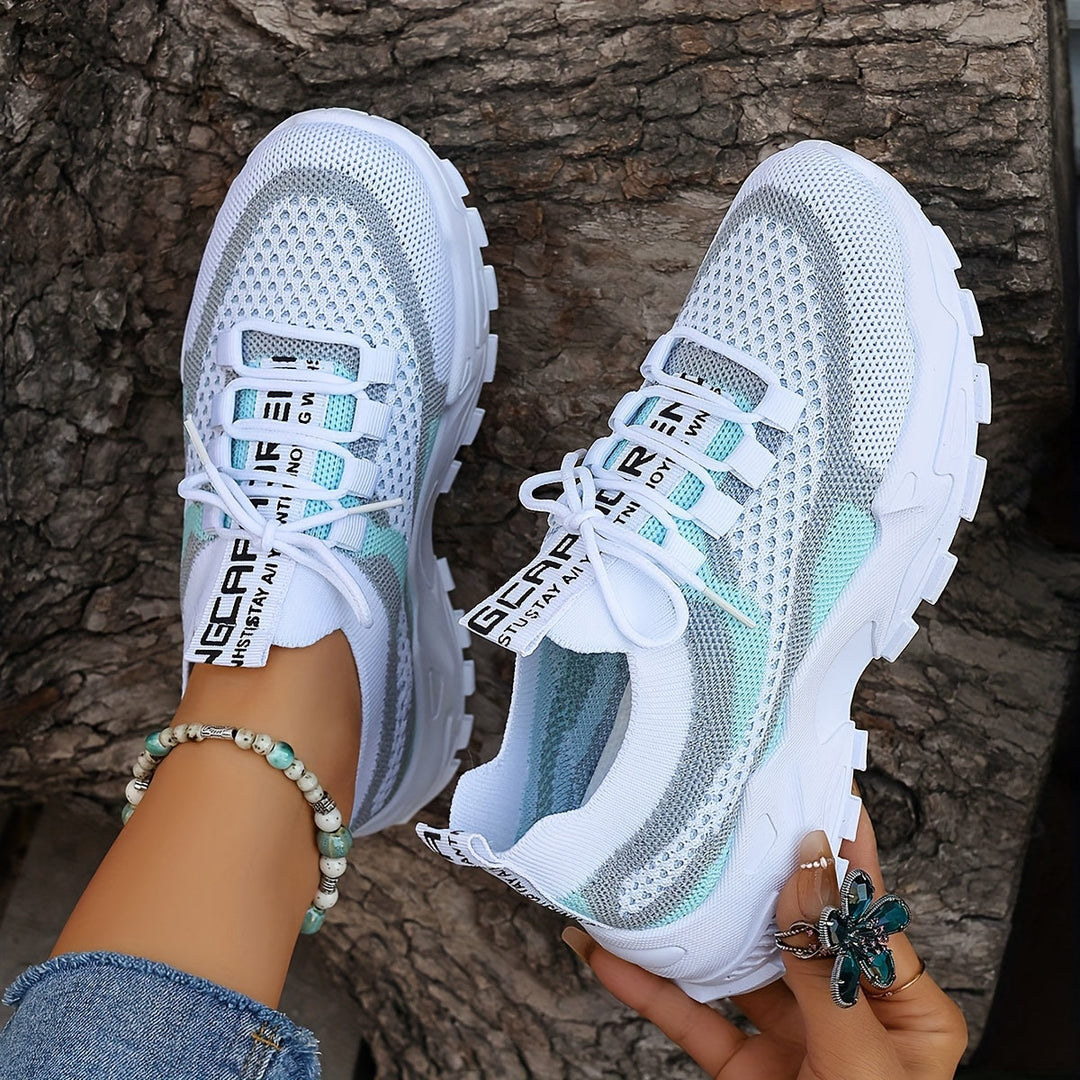 Pink ergonomic women's sneakers offering superior arch support & comfort. Perfect for walking & casual wear.