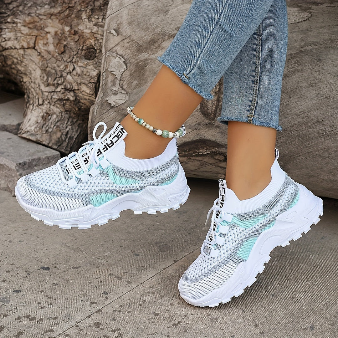 Comfortable women's sneakers in blue, offering ergonomic design for foot pain relief, arch support & stability.