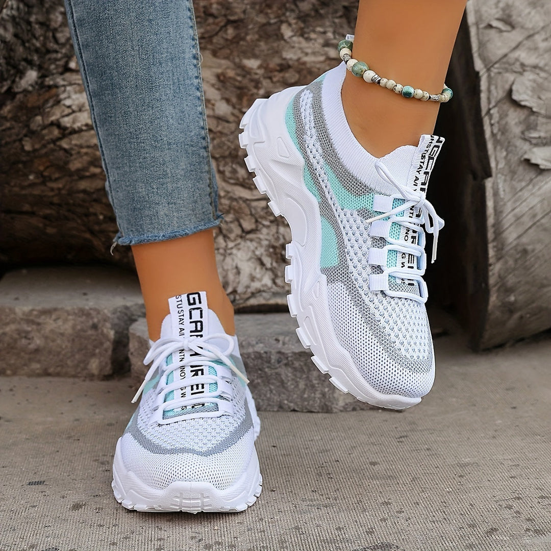 Stylish blue ergonomic women's walking shoes with orthopedic arch support for all-day comfort & posture.