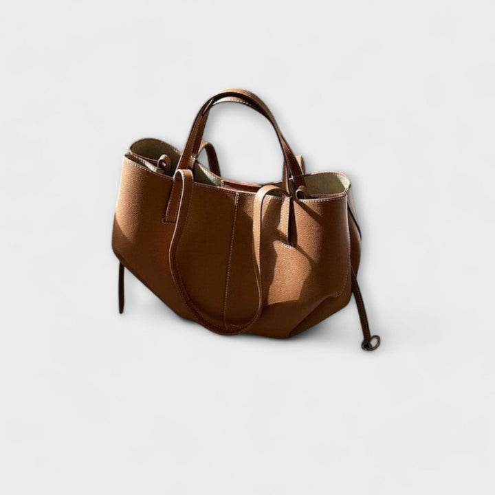 Stylish women's vintage leather tote bag, perfect as an elegant shoulder bag & daily fashion accessory.