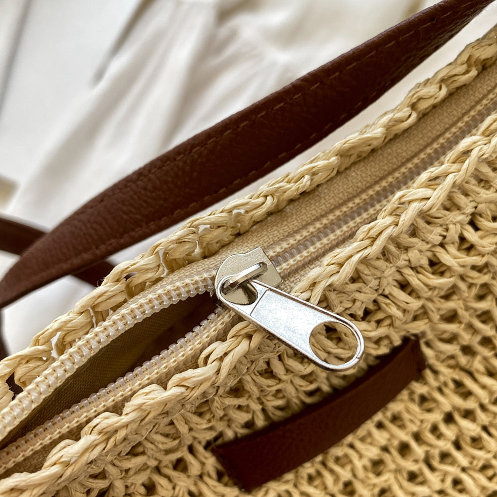 Model wearing a women's spacious bohemian shoulder bag, ideal for daily use and stylish accessory.
