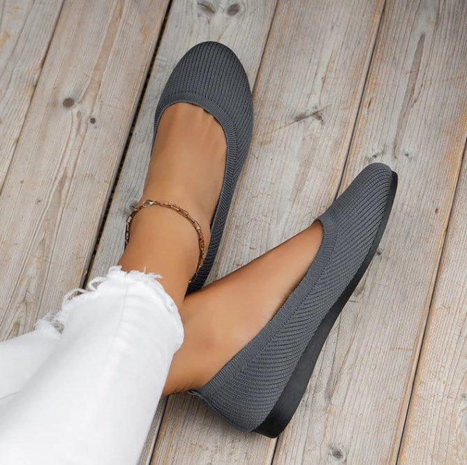Women's comfortable slip-on ballet shoes in a classic design, perfect for fashion and foot health.
