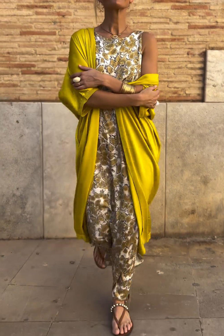Elegant women's gold maxi dress with a coordinating cardigan, perfect for formal events & special occasions.