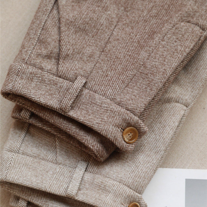 Stylish women's herringbone pants styled for office wear. Elegant, classic, and comfortable all-season trousers.