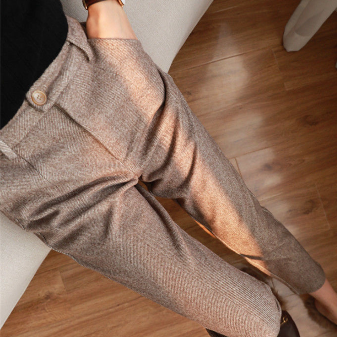 Back view of women's sophisticated herringbone all-season pants. Versatile, comfortable, and classic daily wear.
