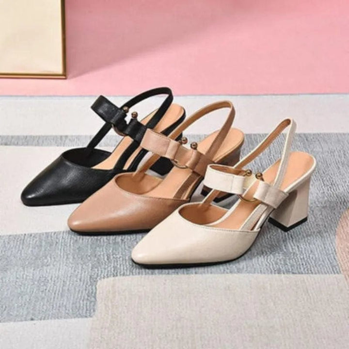 Elegant women's orthopaedic slingback heels, perfect for work, featuring a pointed toe & gold accent.