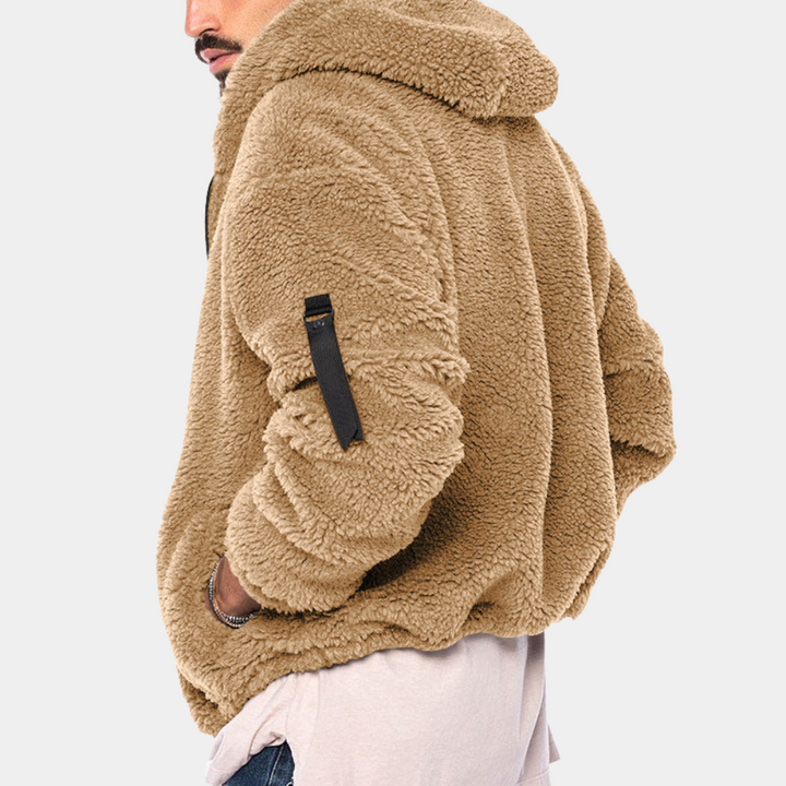 Casual men's zip-up hooded black jacket, ideal for winter layering and daily outdoor activities.