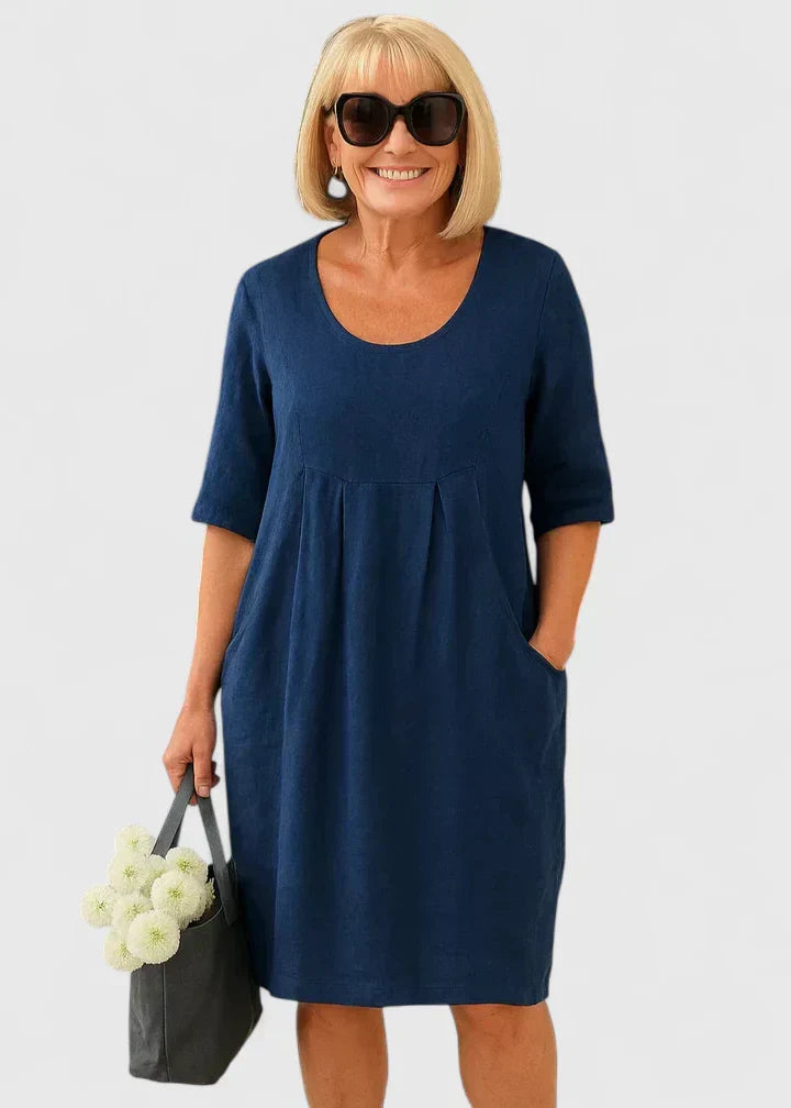 Casual women's midi dress with pockets, half sleeve, scoop neck. Comfortable for everyday spring & summer wear.