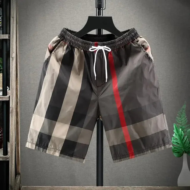 Stylish men's designer shorts, perfect for casual everyday wear. Comfortable brown/khaki fashion bottoms.