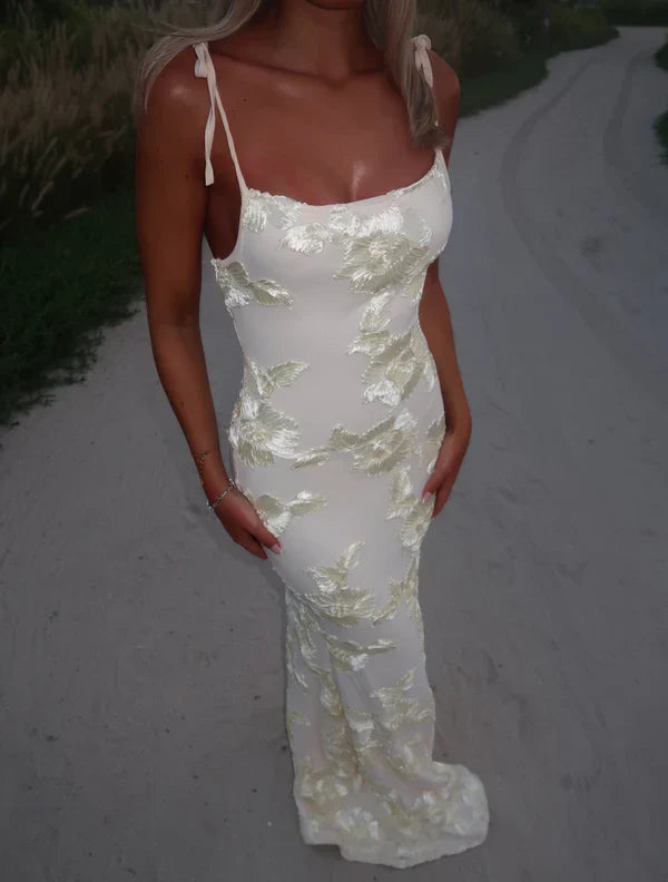 Chic pink floral maxi dress for women with comfortable adjustable straps, great for summer fashion.