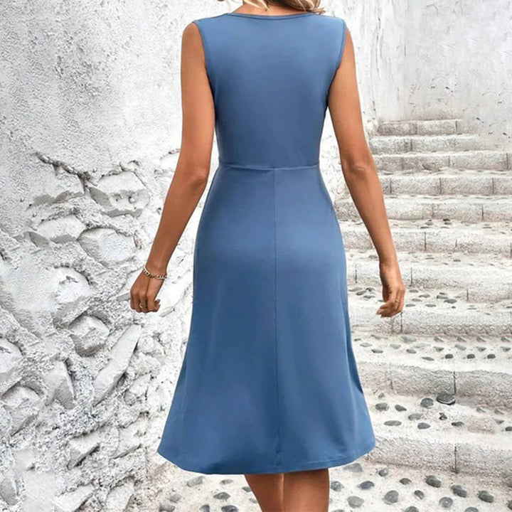 Chic women's A-line printed midi dress, a comfortable and stylish V-neck option for summer beachwear.