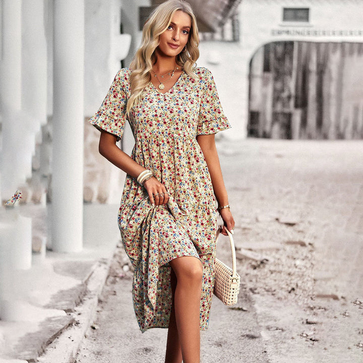 Chic women's floral midi dress with short sleeves, perfect for elegant summer fashion & casual wear.