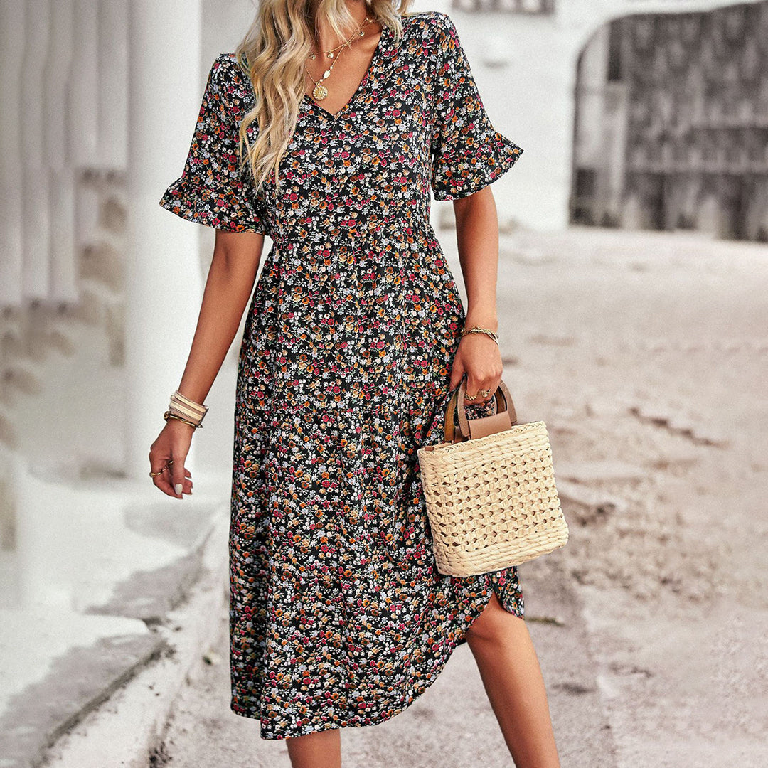 Elegant floral print midi dress for women, ideal for summer occasions, casual outings & chic fashion.
