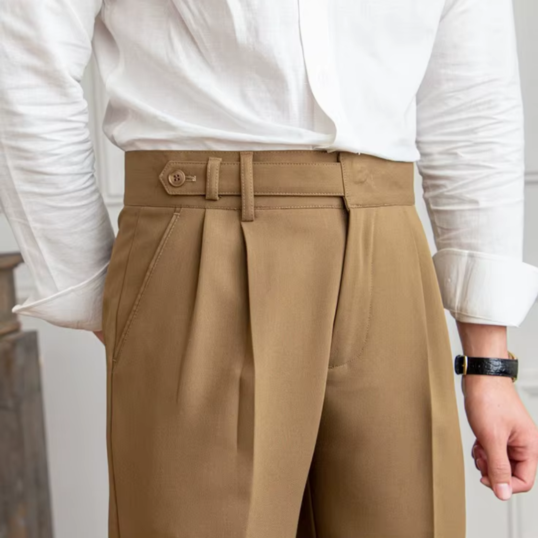 Comfortable beige pleated chino trousers, ideal for all-day wear with style.
