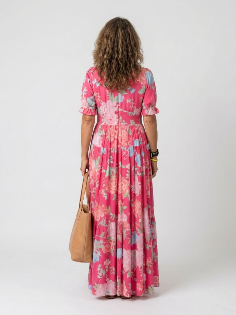 Short sleeve floral midi dress for women, featuring a flattering V-neck and gathered waist. Stylish spring wear.