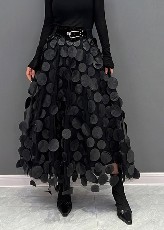 Versatile women's polka dot patchwork maxi skirt, elegant and playful for various occasions.