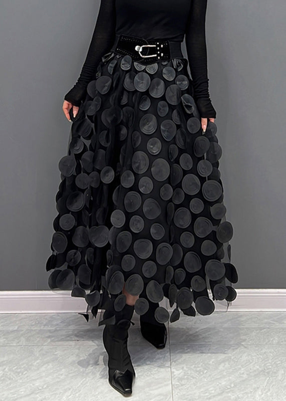 Model wearing a stylish women's polka dot patchwork maxi skirt, perfect for chic fashion.