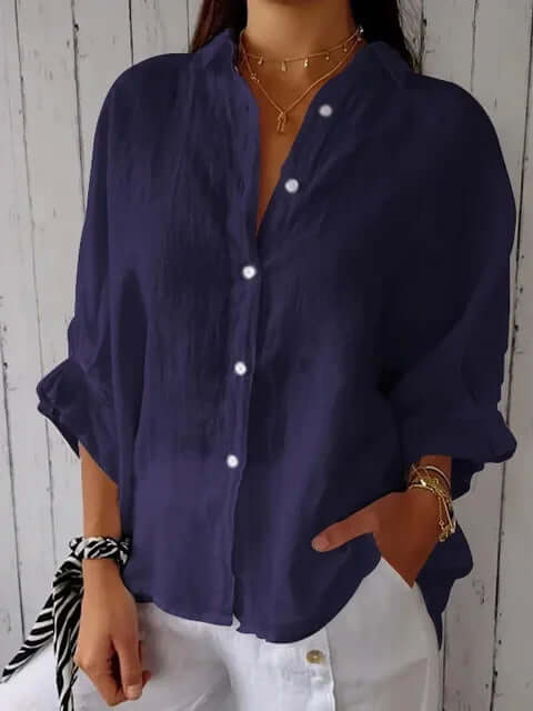Effortless women's casual long-sleeve shirt. Relaxed fit, stylish loop closure top, perfect for spring/summer everyday wear.