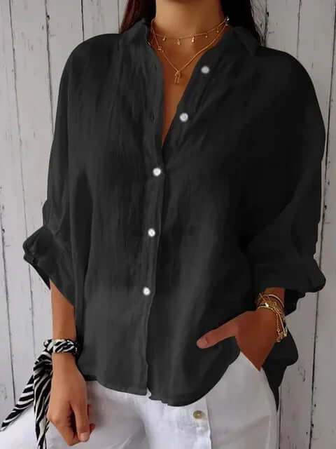 Comfortable women's casual long-sleeve shirt with a relaxed fit & stylish loop closure, perfect for everyday wear.