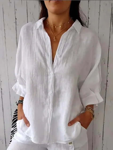 Women's casual long-sleeve shirt with unique loop closure. Perfect relaxed fit for spring & summer style.