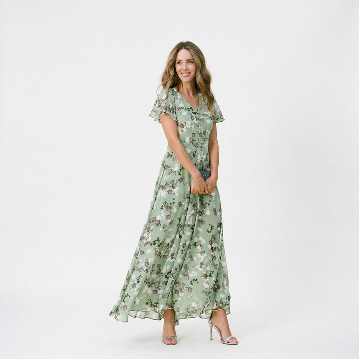 Women's sophisticated floral maxi dress featuring a flattering V-neck, suited for wedding guests.