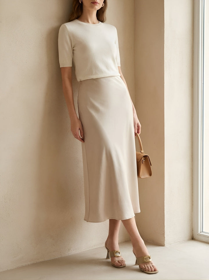 Flared A-line midi skirt for women, high-waisted design. Perfect elegant summer or spring everyday fashion.