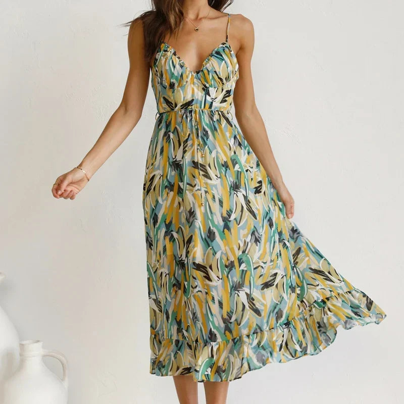 Vibrant Clara women's sleeveless printed v-neck maxi dress, exuding holiday vibes, perfect for summer elegance.
