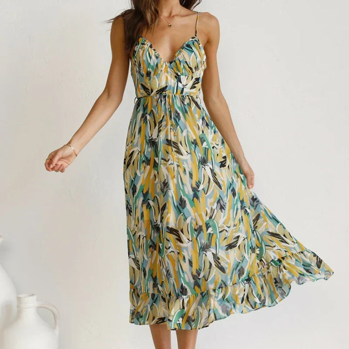 Vibrant Clara women's sleeveless printed v-neck maxi dress, exuding holiday vibes, perfect for summer elegance.
