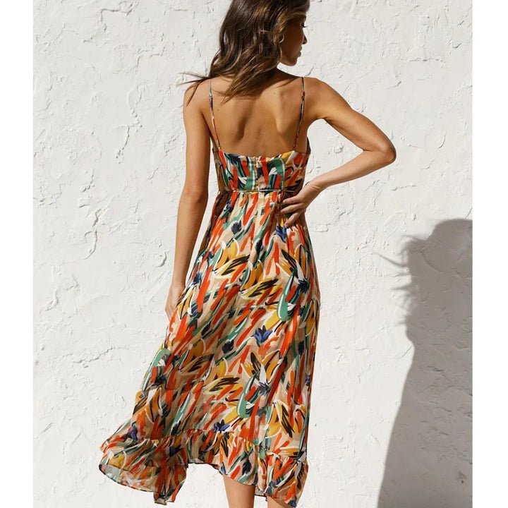 Flowy Clara printed maxi dress for women, a comfortable v-neck summer dress for casual days or holidays.