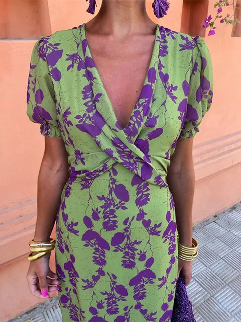 Women's stylish floral wrap maxi dress with a deep V-neck, ideal for elegant spring & summer occasions.
