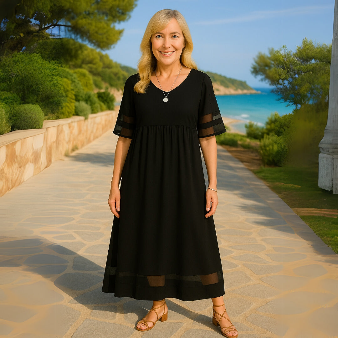 Elegant women's maxi dress, chic and flattering, perfect for a sophisticated evening event.