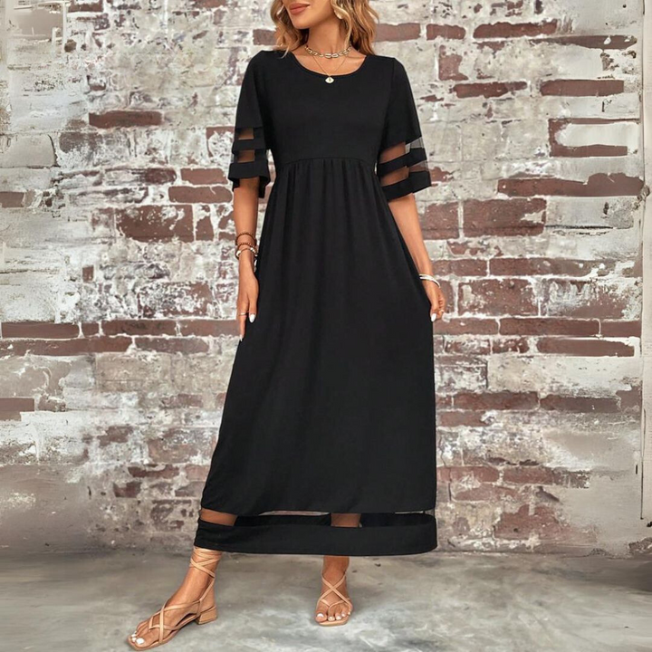 Full-length elegant women's maxi dress, ideal for comfortable summer style & chic evening wear.