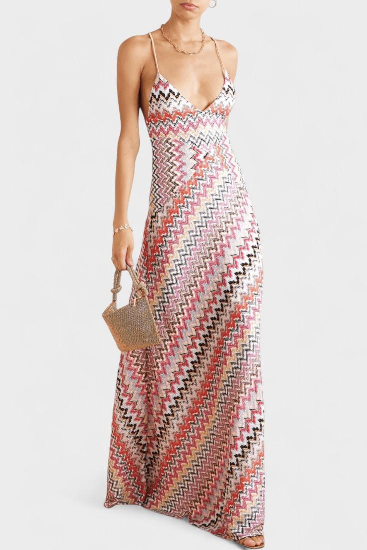 Elegant women's shimmering maxi dress with metallic knit, perfect for summer parties or evening wear.