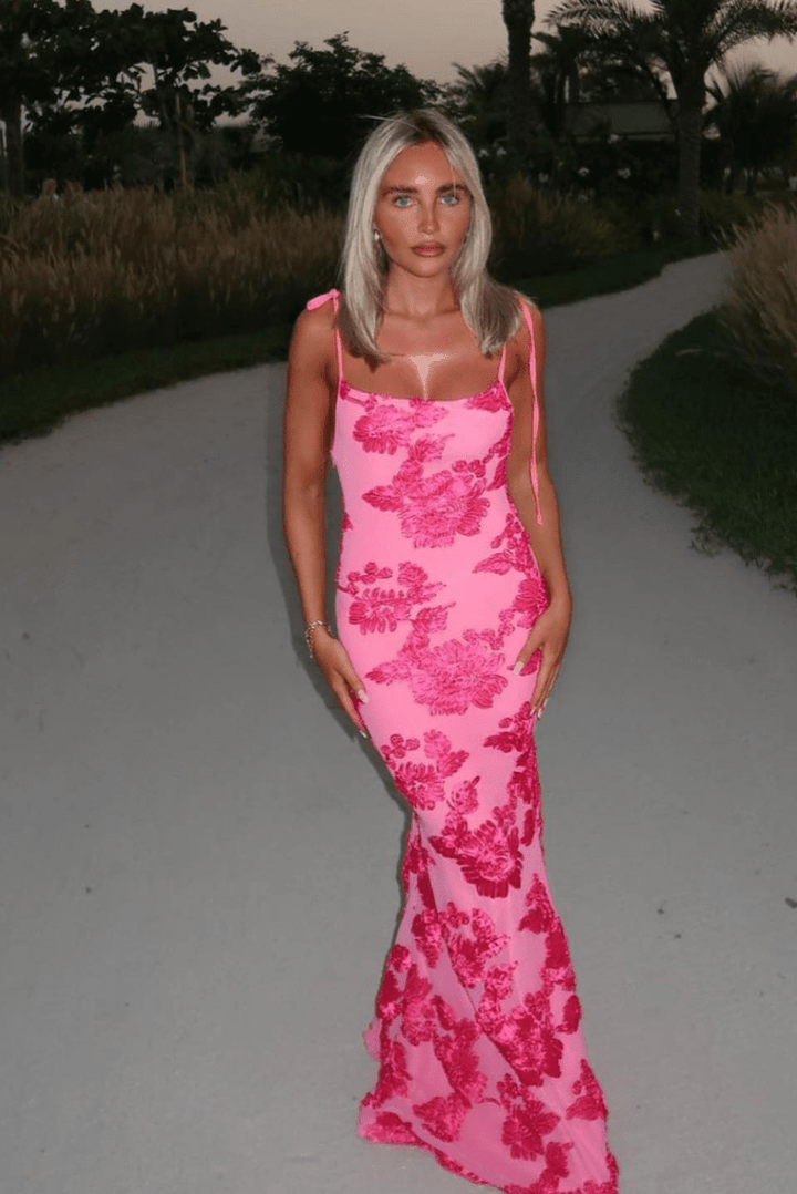 Women's romantic floral embroidered maxi dress, elegant and long, perfect for summer occasions and parties.