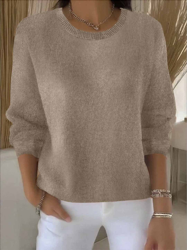 Cozy women's long sleeve knit jumper, offering elegant everyday style & warmth. Versatile winter sweater.