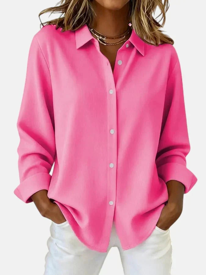 Fuchsia women's elegant button collar blouse. Versatile & comfortable for effortless style. Chic fashion look.
