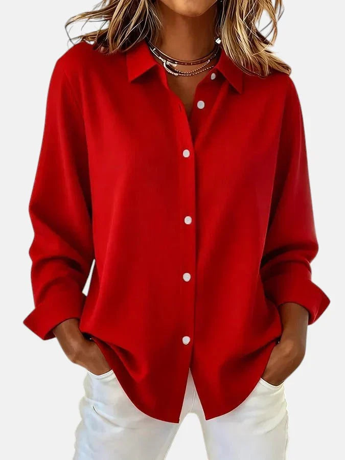 Pink elegant women's blouse with button collar. Effortless style & comfort for modern versatile fashion.