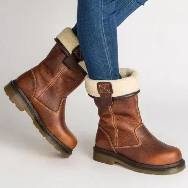 Men's brown pull on ankle boots with cozy faux shearling trim, ideal for stylish, comfortable winter and casual everyday wear.