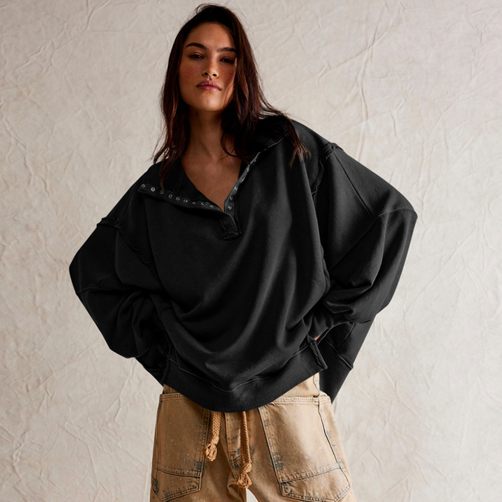 Women's oversized Henley pullover. Relaxed fit, long sleeve, perfect for casual everyday wear.