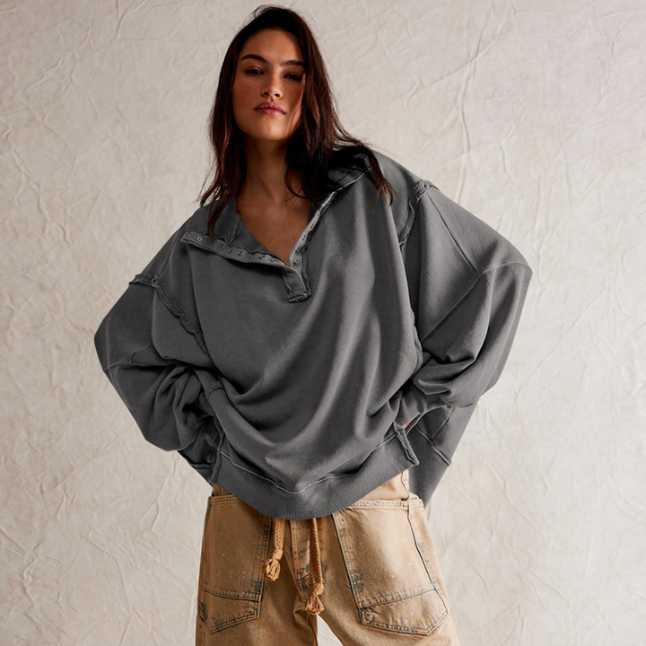 Women's relaxed fit oversized Henley pullover, long sleeve. Comfortable casual top for versatile everyday wear.