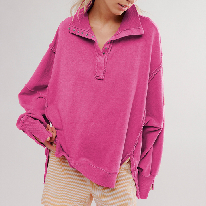 Chic women's oversized Henley top for a relaxed, casual look. Long-sleeve comfort for everyday style.
