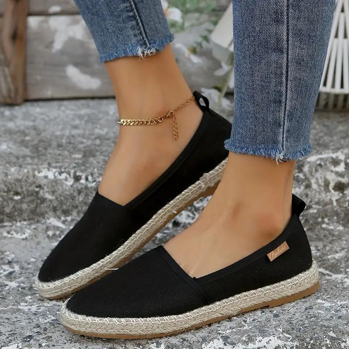 Sky blue flat espadrille shoes for women. Comfortable & lightweight slip-ons, ideal for casual everyday summer style.