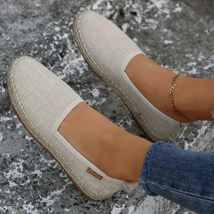 Women's flat espadrille shoes, perfect for summer. Lightweight slip-on design offers comfort & effortless casual style.