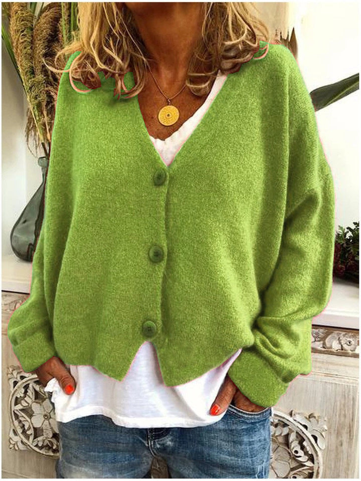 Full shot of a women's chic V-neck button-front cardigan, perfect for layering.