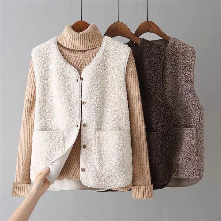 Cozy women's layering fleece vest, great for transitional autumn fashion & everyday wear.