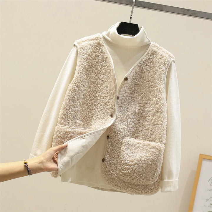 Winter essential women's fleece vest, soft & warm for comfortable layering.