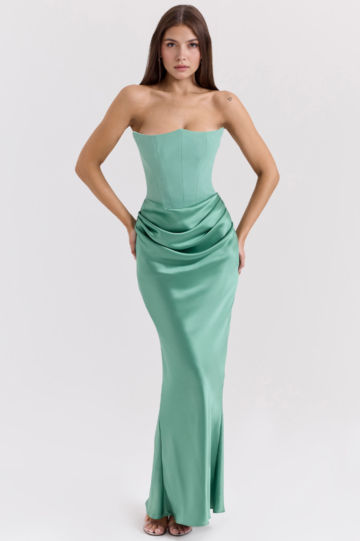 Sophisticated strapless maxi dress for women, ideal as a wedding guest or party dress.
