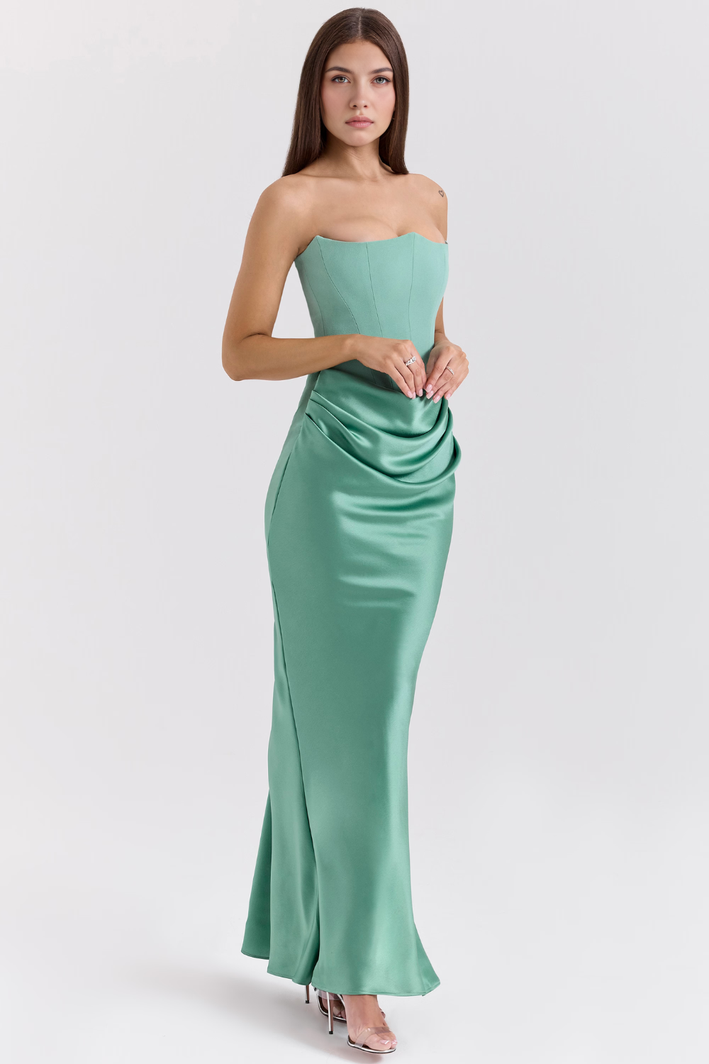 Glamorous women's formal gown with a strapless design, suitable for prom or galas.