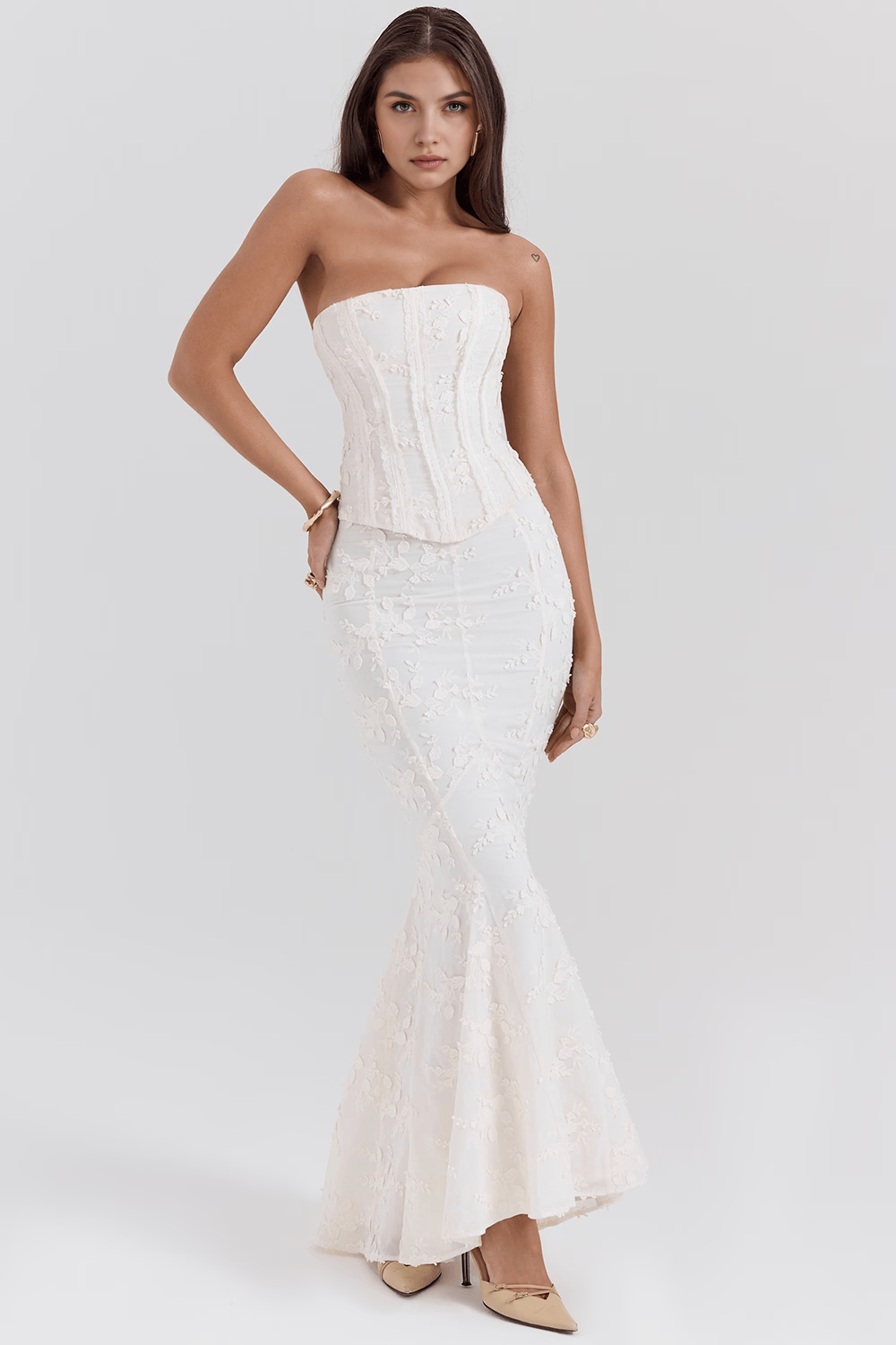 Beautiful women's ivory floral embroidered bloom gown, an elegant and romantic special occasion dress.