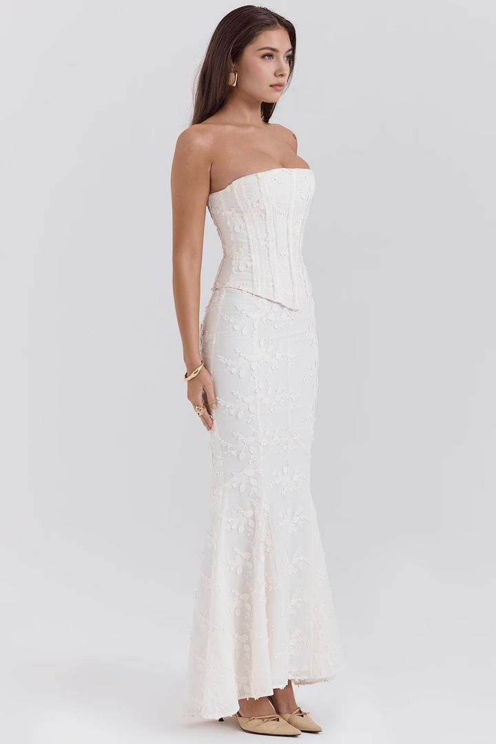 Stunning ivory floral embroidered gown with intricate details, an elegant choice for women's parties.